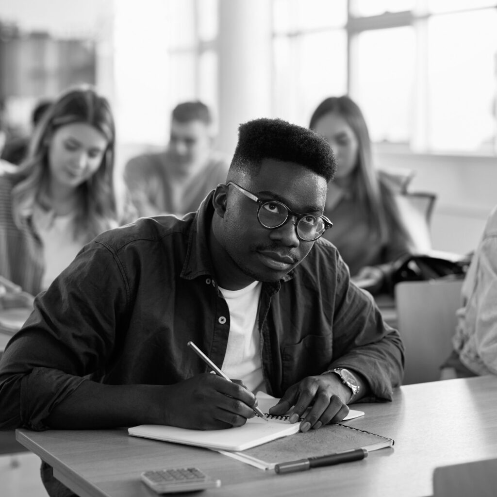 Student taking notes